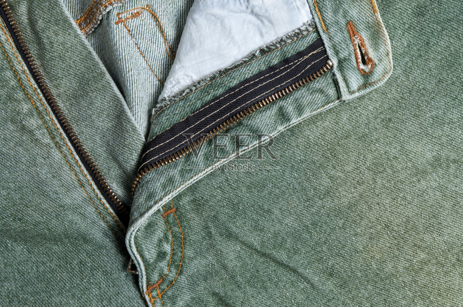 绿色牛仔细部照片摄影图片