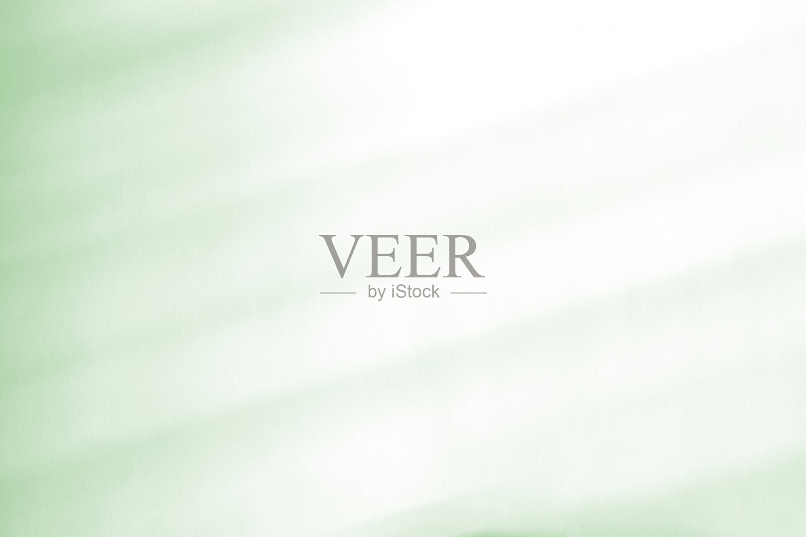 窗户自然阴影覆盖在浅绿色纹理背景上，用于覆盖在产品展示、背景和模型上，抽象的阴影图案照片摄影图片