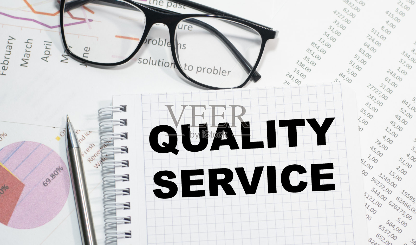 经营理念-俯视图笔记本书写客户证言照片摄影图片