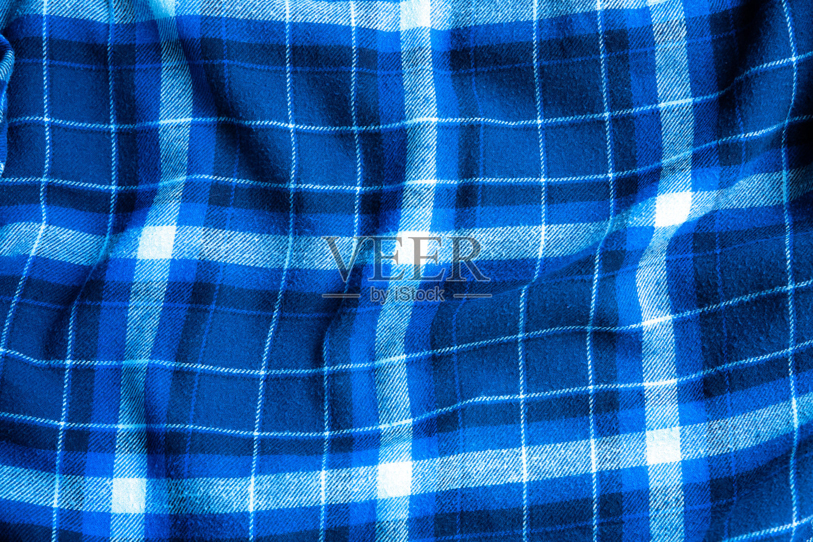 方格布纹理。广场在纺织品上。天然面料背景。照片摄影图片