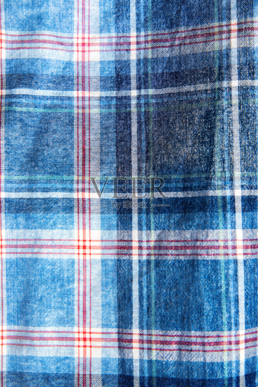 方格布纹理。广场在纺织品上。天然面料背景。照片摄影图片