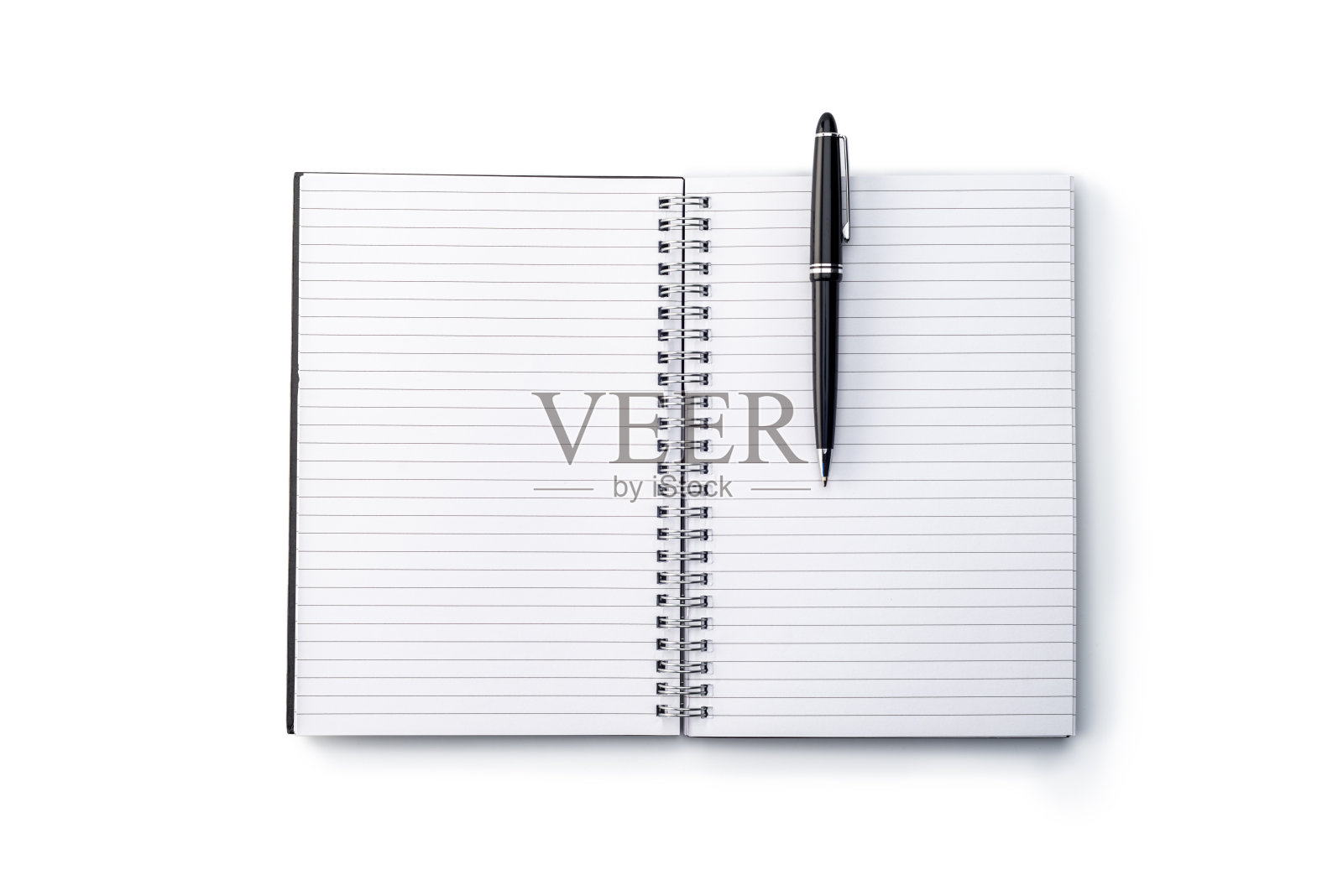 办公室:白底笔记本，一支笔照片摄影图片