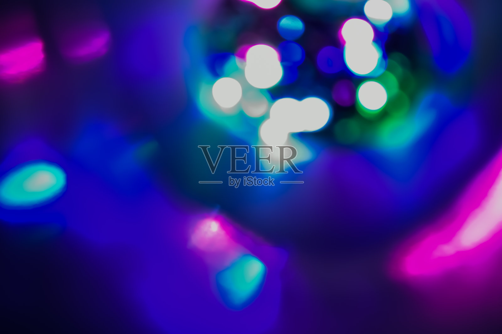 无聚焦灯光的背景图像。照片摄影图片