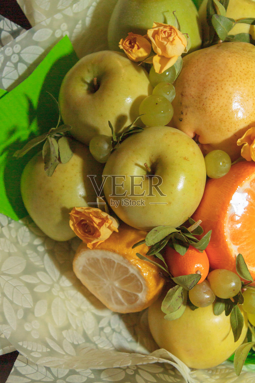 水果和绿色的花香，有苹果和柑橘的香味照片摄影图片