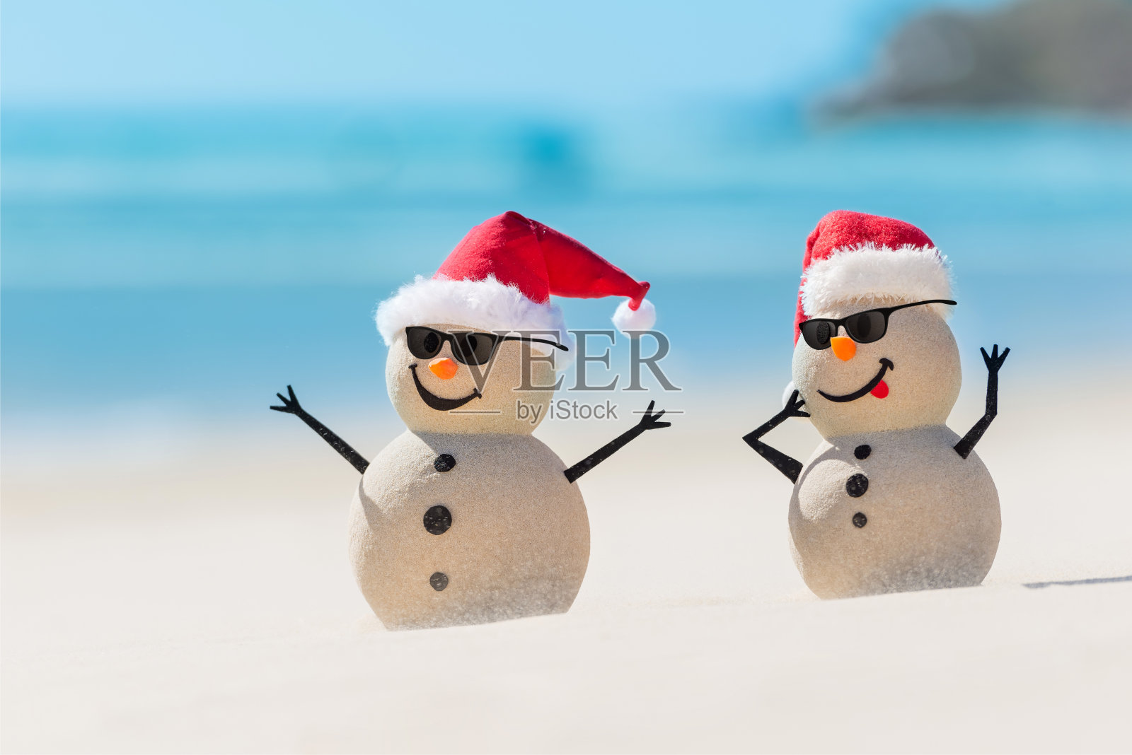 雪人正在庆祝圣诞节照片摄影图片