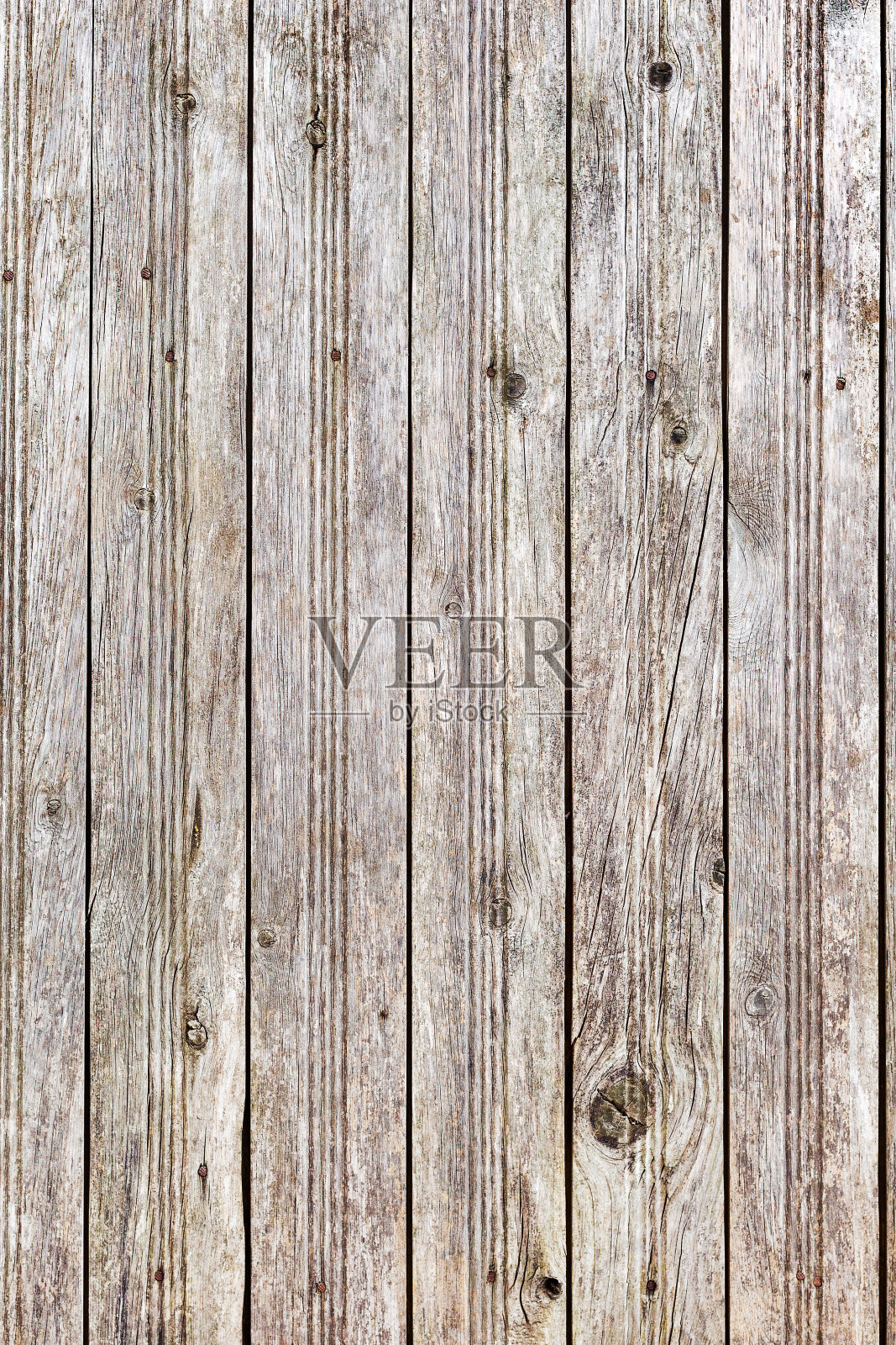 抽象的创作背景，混乱的笔触的旧裂纹油漆在木板上。旧的表面有油漆痕迹，风化，划痕和设计裂缝照片摄影图片