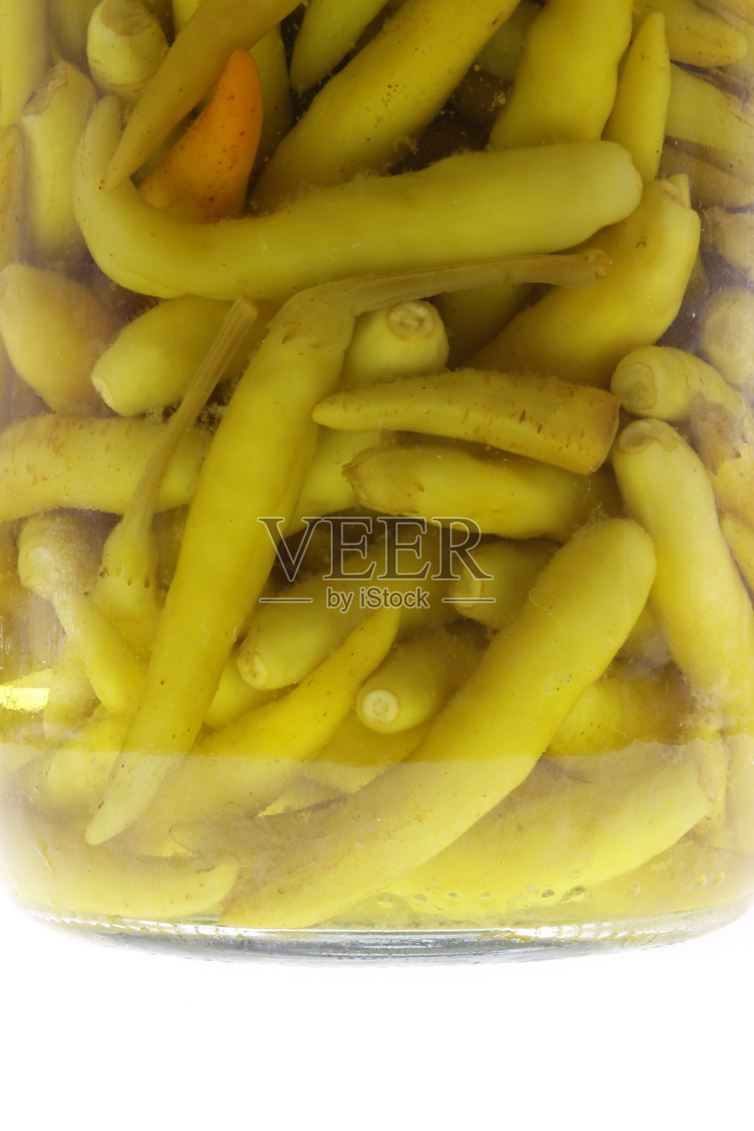 泡椒在一个玻璃罐子里照片摄影图片