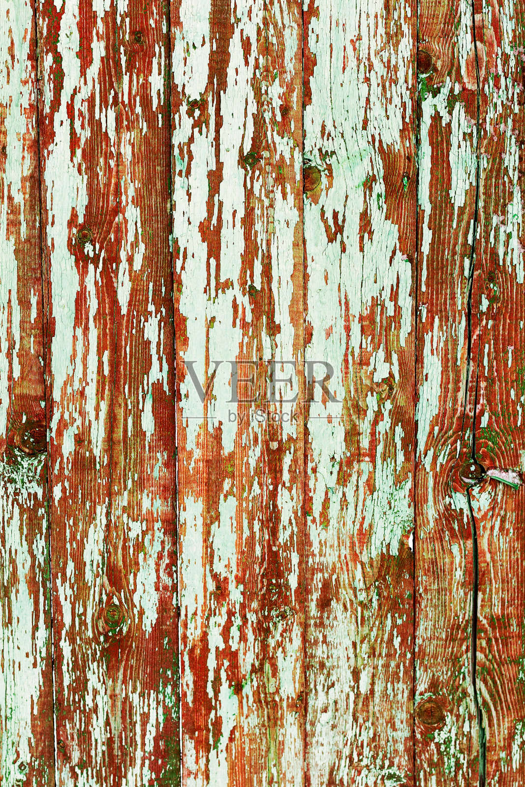 抽象的创作背景，混乱的笔触的旧裂纹油漆在木板上。旧的表面有油漆痕迹，风化，划痕和设计裂缝照片摄影图片