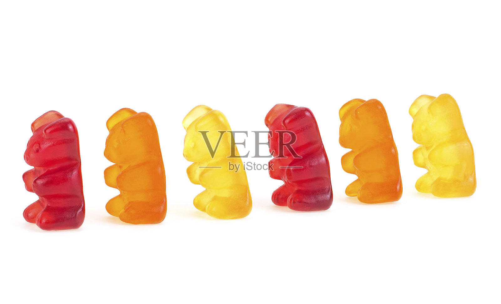 收集彩色的果冻软糖熊孤立在白色的背景。小熊软糖选择。照片摄影图片