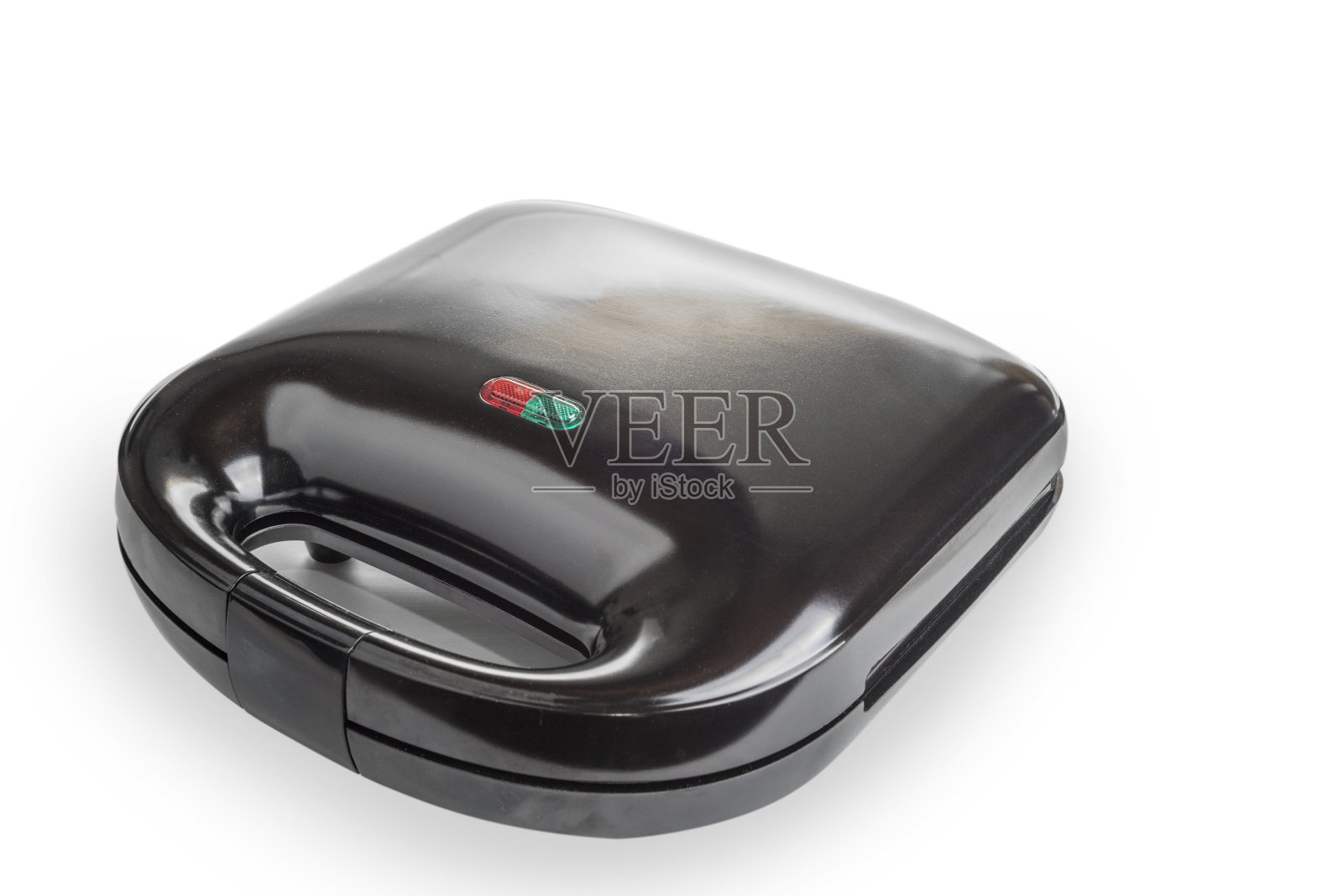 在白色背景上切片三明治烤面包机照片摄影图片