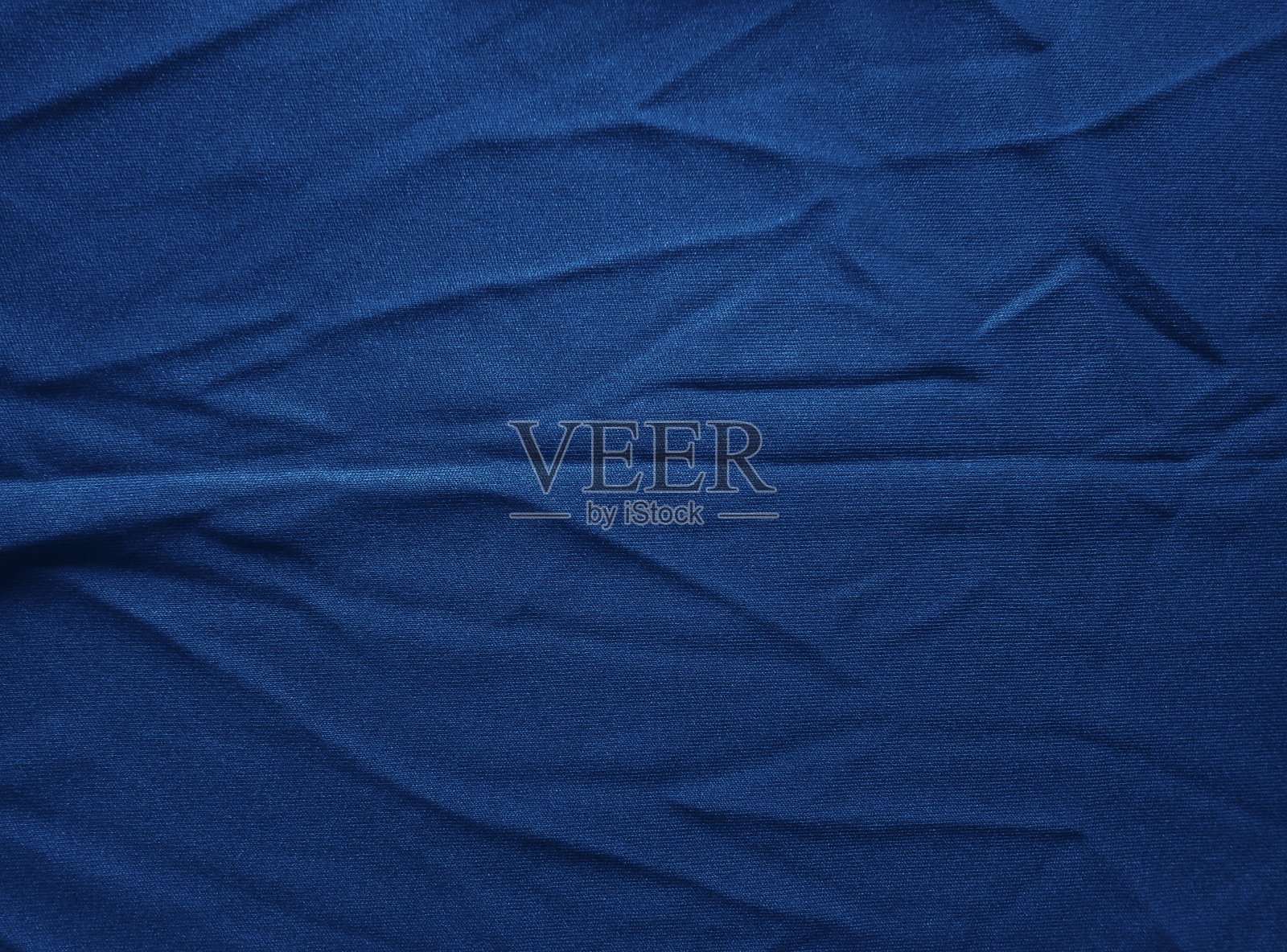 深蓝色棉布表面照片摄影图片