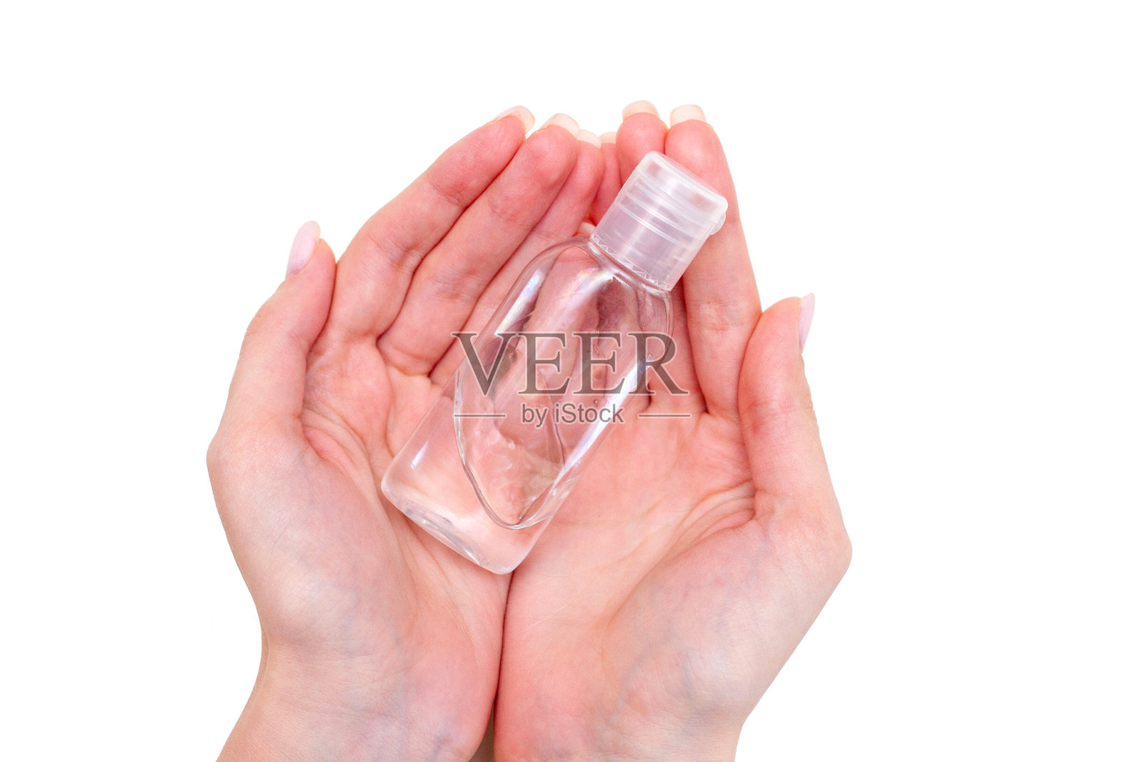 瓶子用抗菌抗菌凝胶在手上隔离白色照片摄影图片