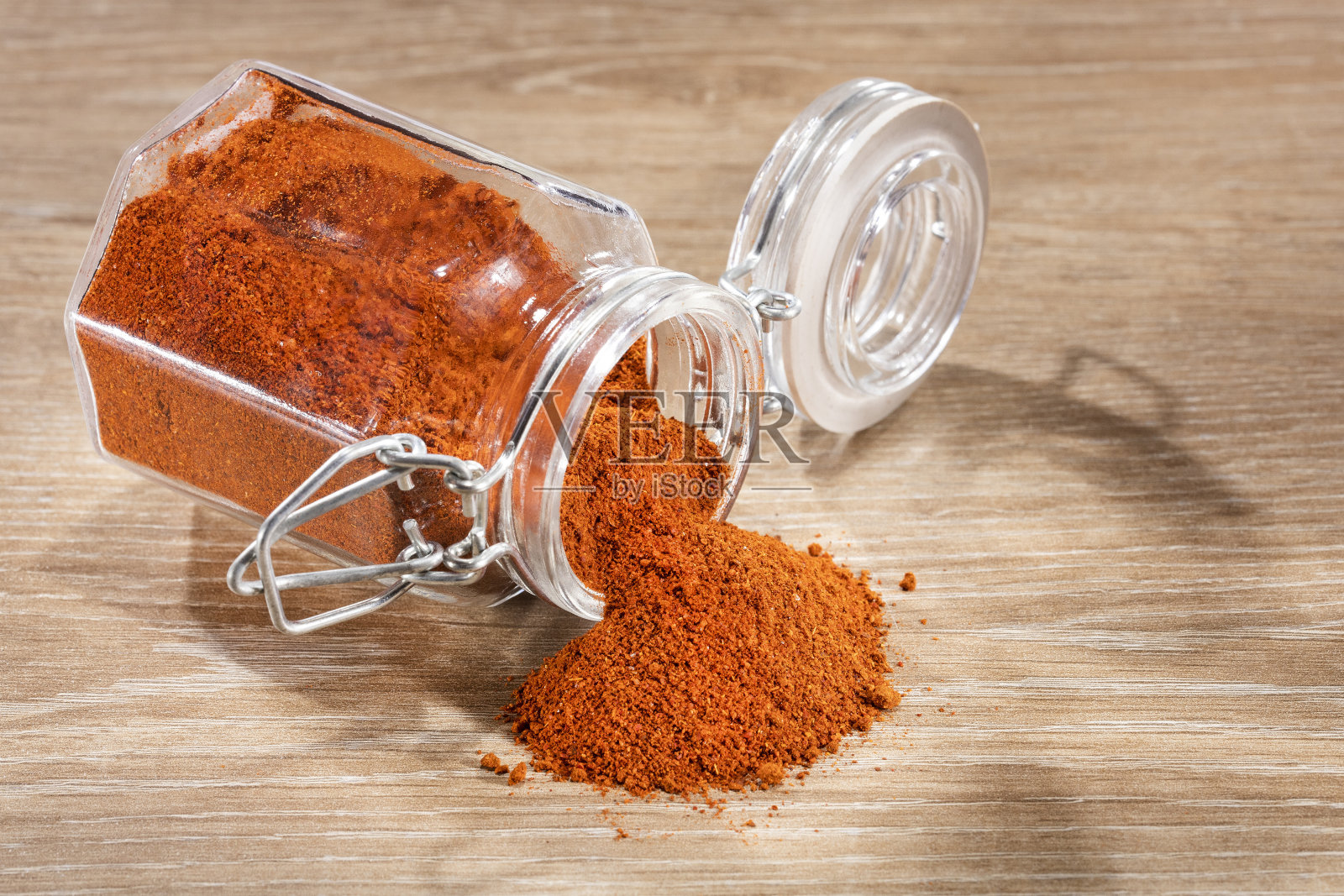 瓶中有机辣椒粉-辣椒照片摄影图片