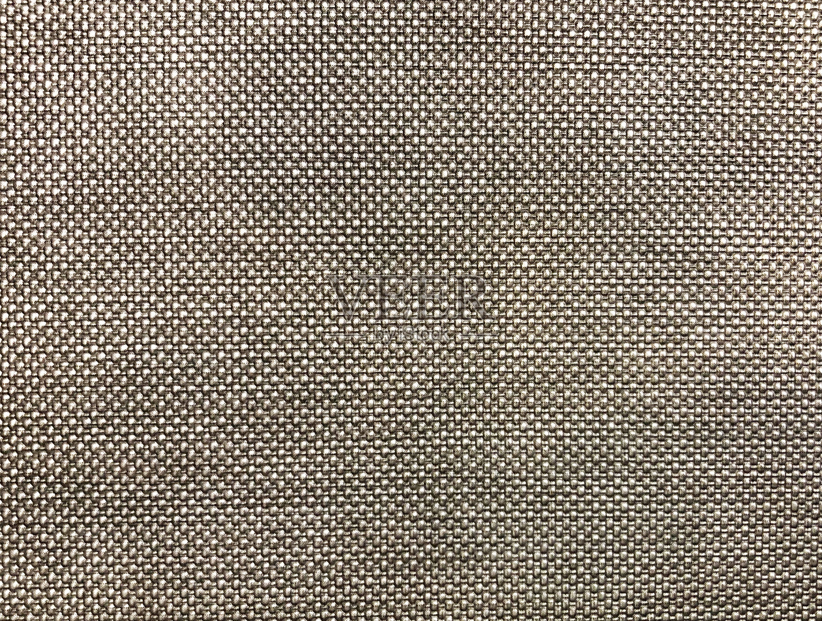 一个特写和微距照片的灰色编织织物，可以看到美丽的纱线结构的细节，适合用作背景或墙纸。照片摄影图片