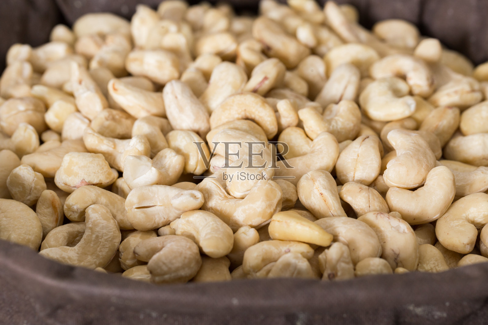 容器中白色腰果的图像照片摄影图片