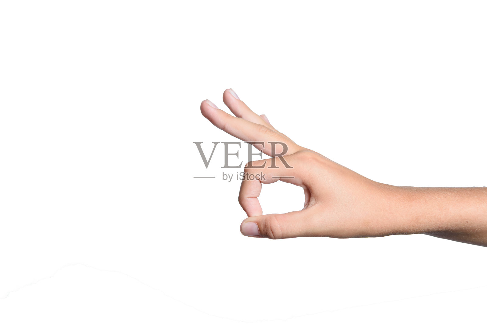 一个少年的手孤立在白色背景上。照片摄影图片