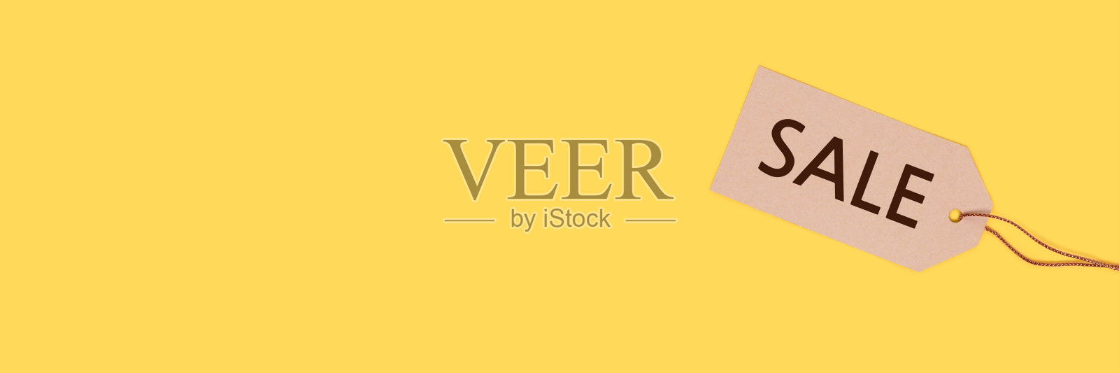 黄色背景上有“特价”字样的标签。照片摄影图片