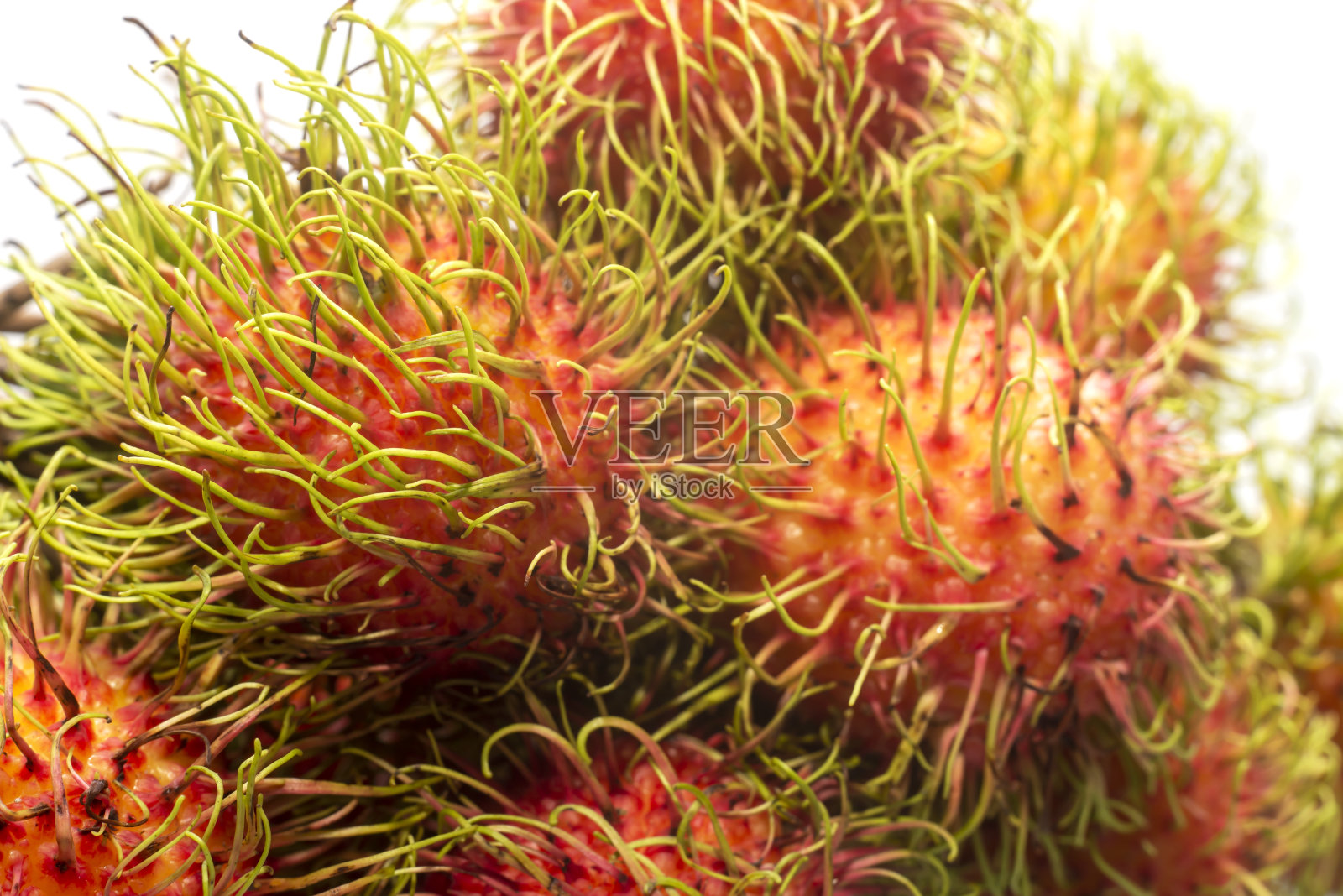 红毛丹水果，白色背景上的当地水果。照片摄影图片