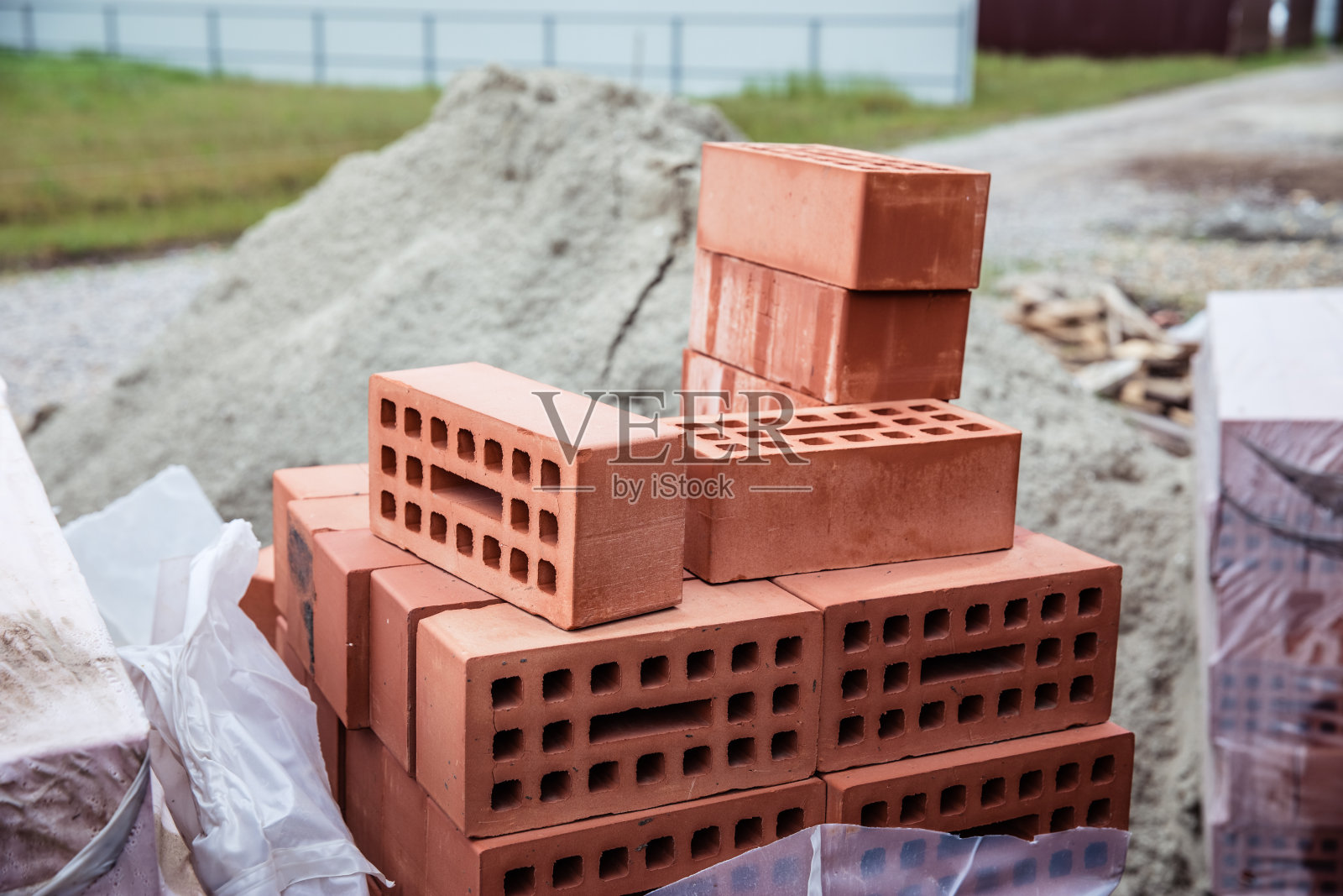 一堆旧红砖。建造房屋照片摄影图片