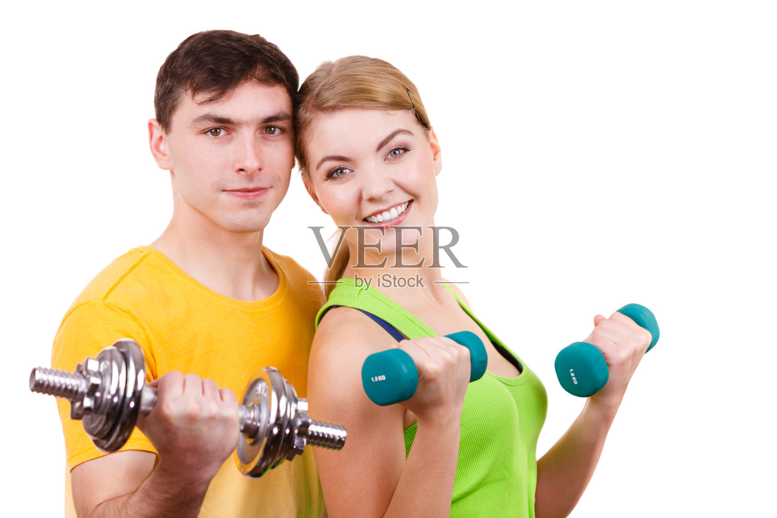 夫妇练习哑铃举重照片摄影图片