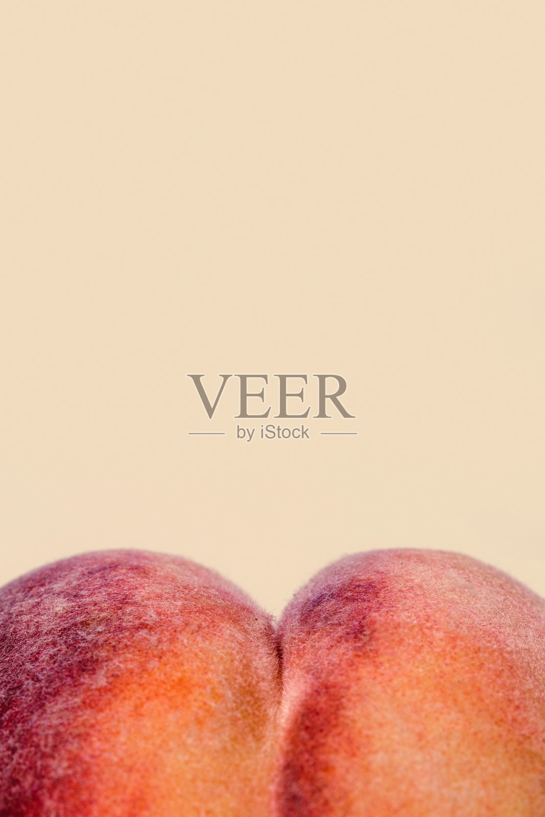 新鲜的桃子在桃子颜色的背景照片摄影图片