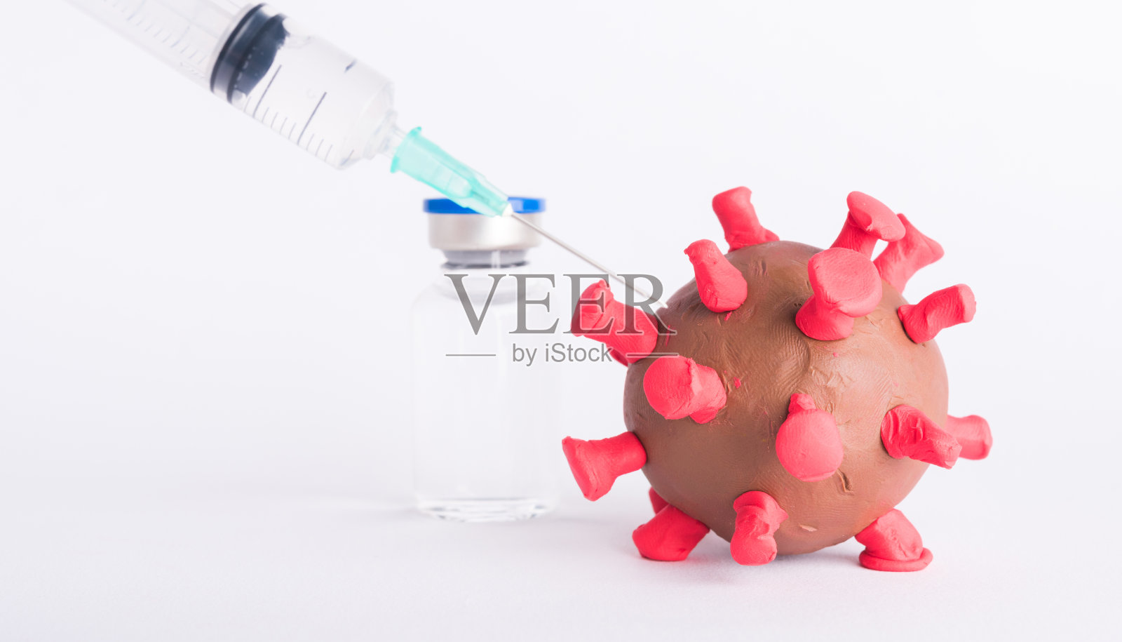 橡皮泥疾病细胞病毒瓶疫苗及注射器照片摄影图片
