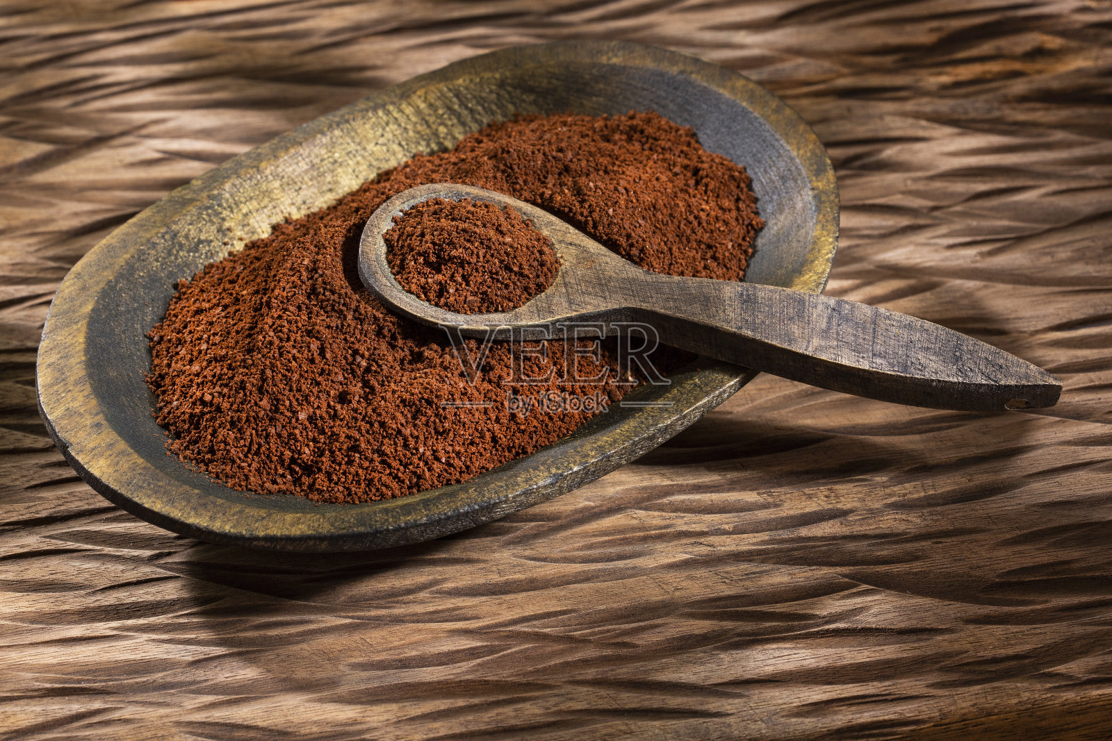 研磨咖啡豆-美味的哥伦比亚咖啡。Coffea照片摄影图片