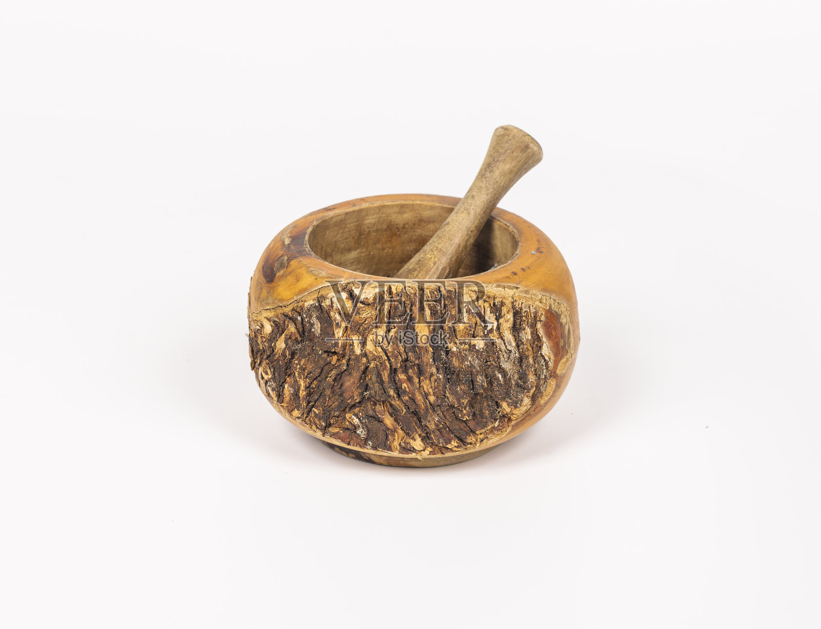 一个用杵手工制作的木臼的特写镜头照片摄影图片