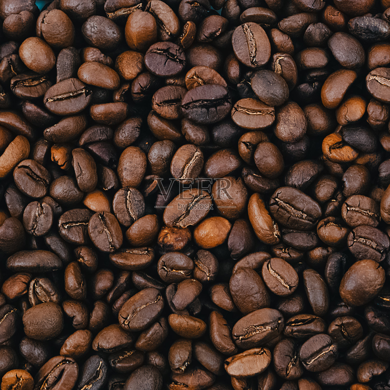 咖啡粒。背景烤咖啡豆棕色。布局。照片摄影图片