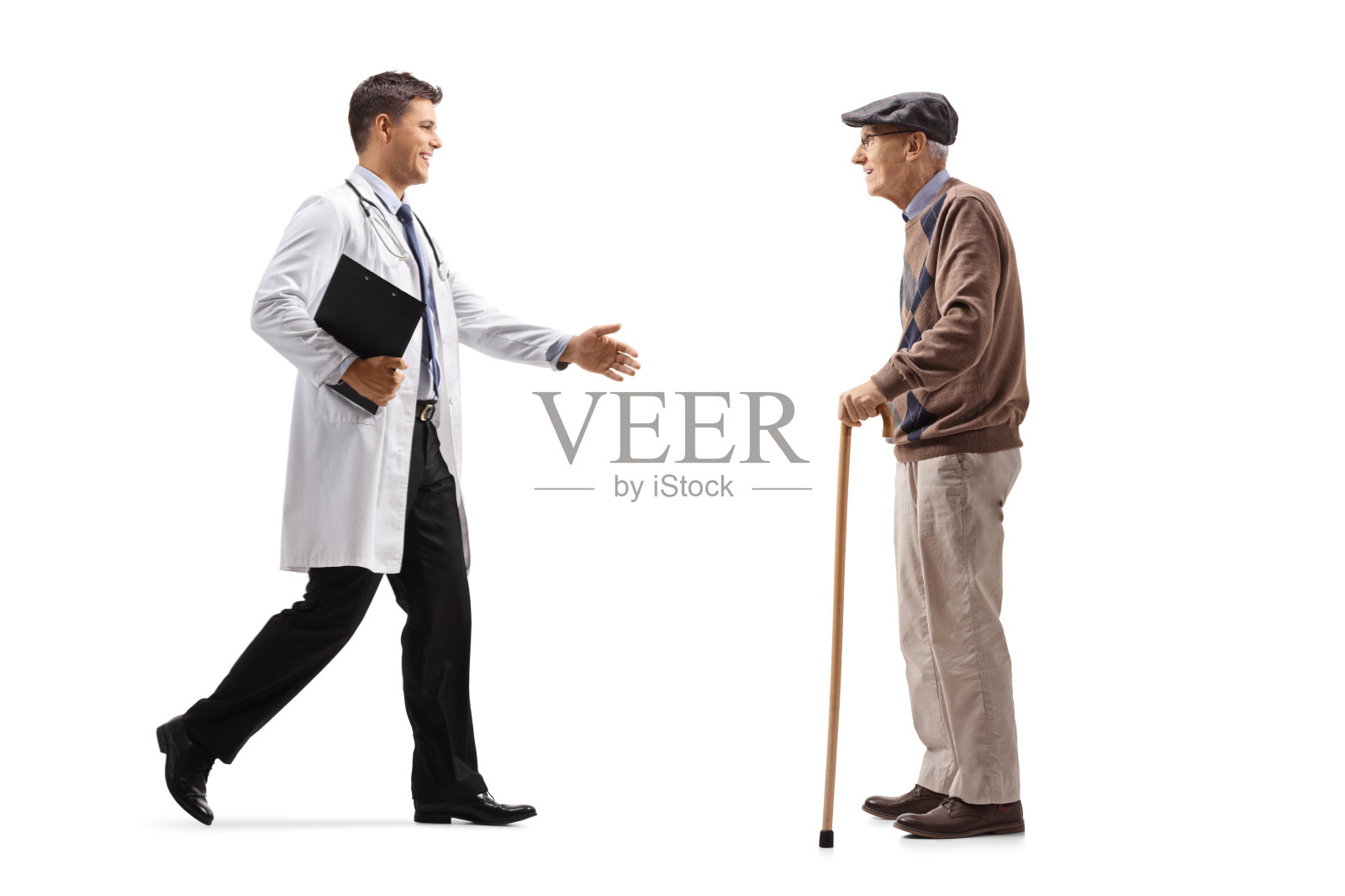 一名男医生用手问候一位拄着拐杖的老人的全长肖像照片摄影图片