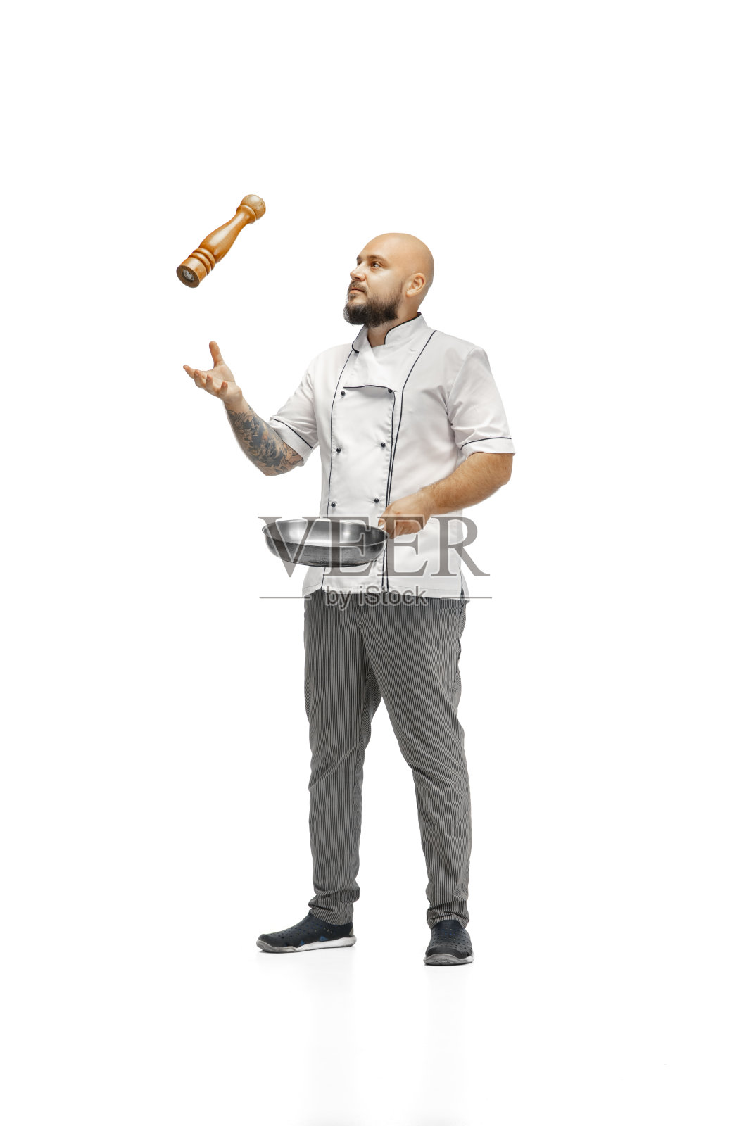 一个男厨师的肖像厨师，屠夫孤立在一个白色的工作室背景照片摄影图片