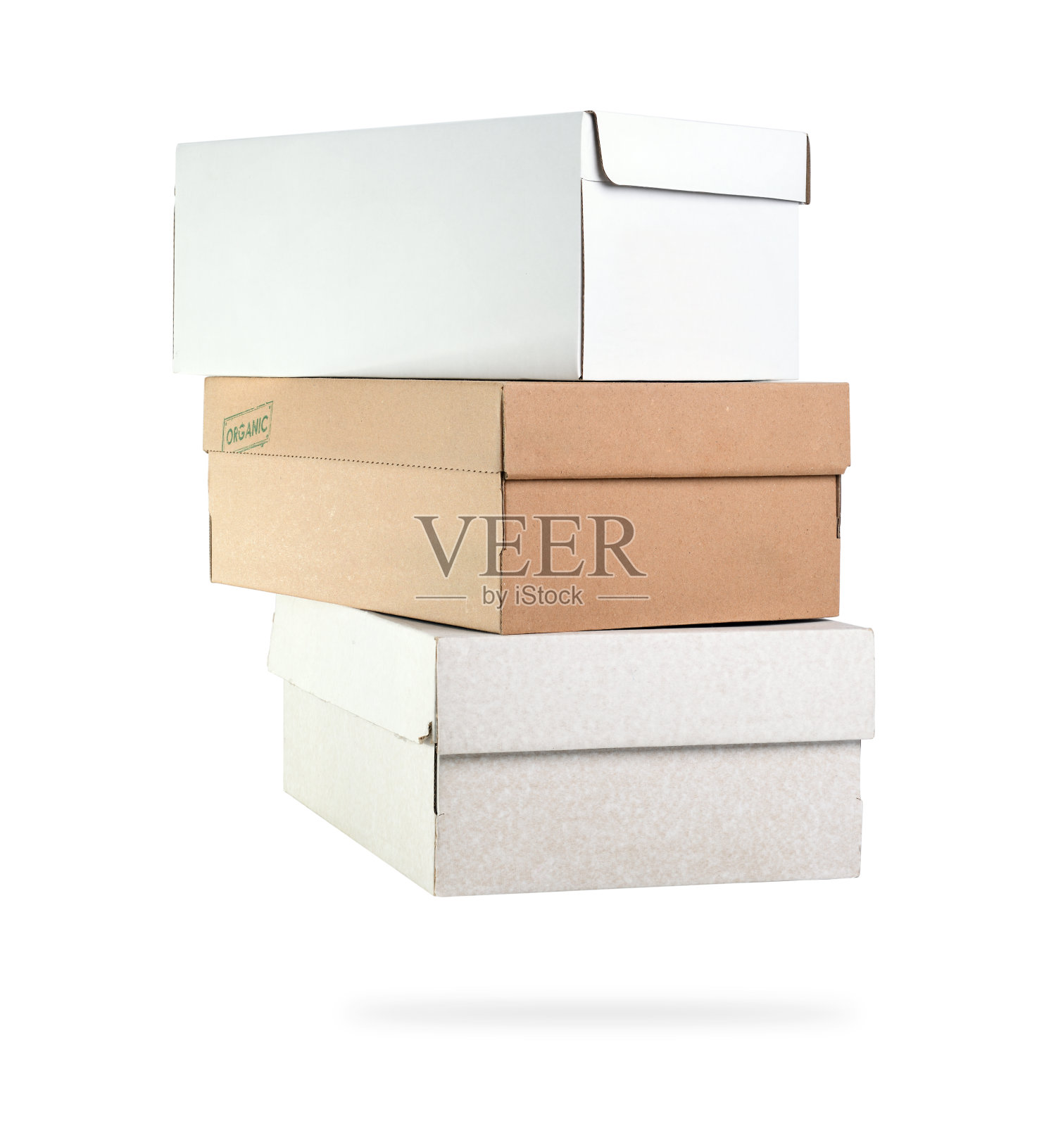 白色背景上的一堆纸箱。箱子递送业务上白背景隔离。照片摄影图片