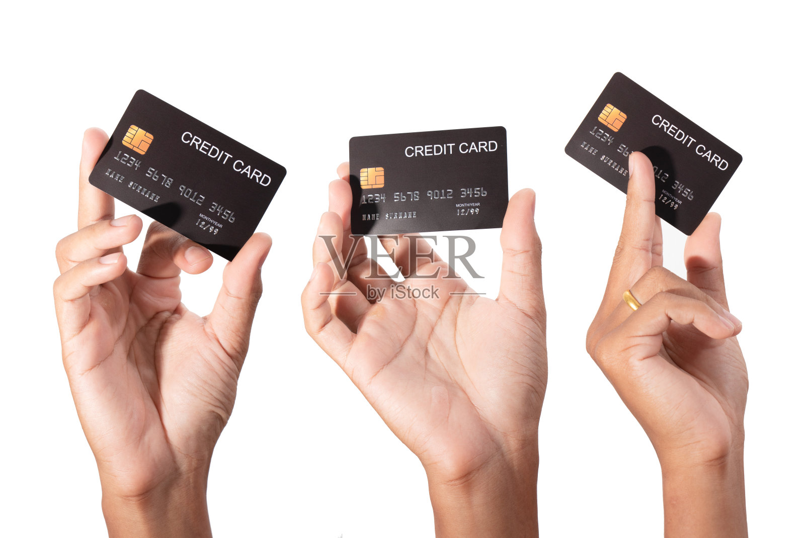 手握信用卡孤立上白。照片摄影图片