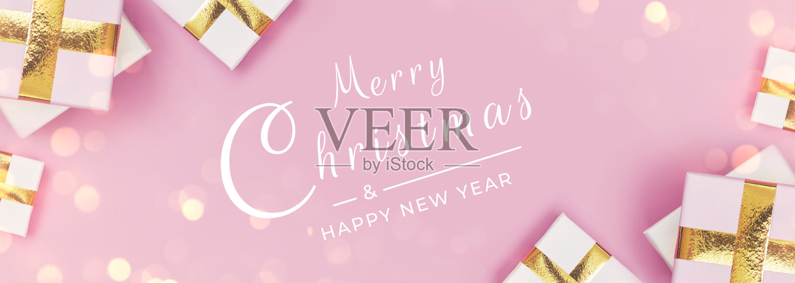 粉色背景上的圣诞礼物banner照片摄影图片