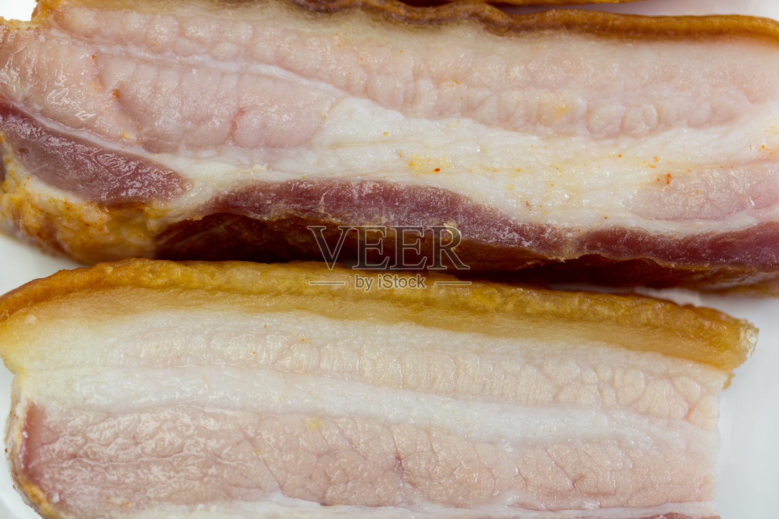 用油煎的厚腌肉条照片摄影图片