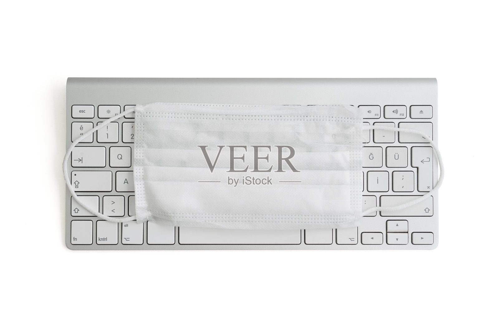 Corona covid-19工作口罩键盘在白色背景上隔离剪切路径照片摄影图片