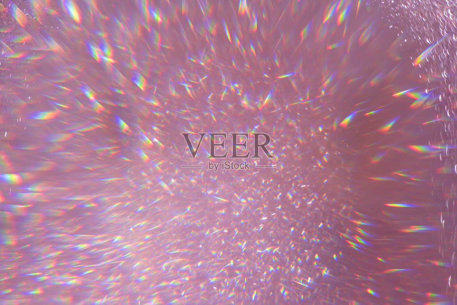 金色的粉色亮片，闪亮的闪光地毯。特写镜头，景深很浅。宏。照片摄影图片