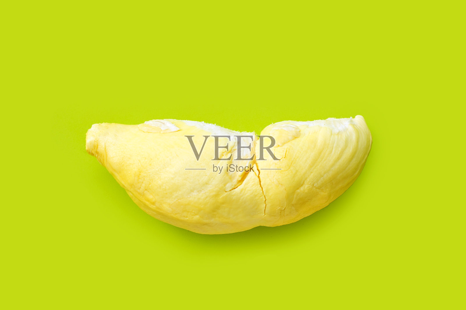 鲜切榴莲，绿色背景。照片摄影图片