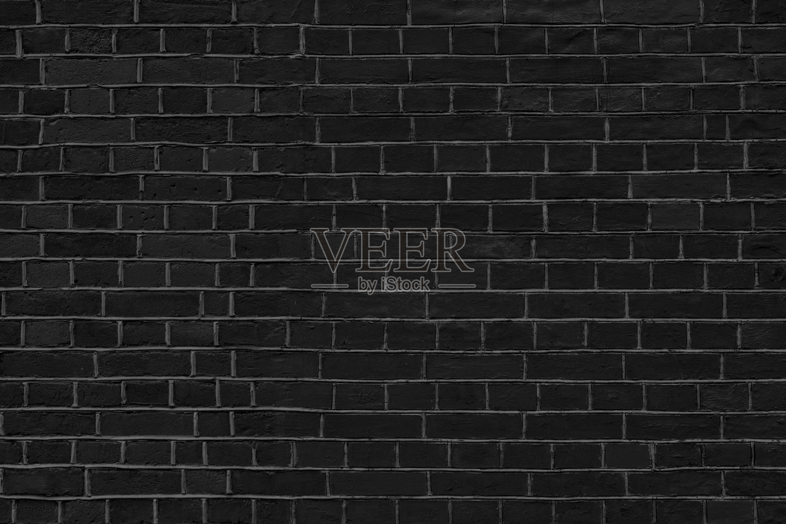 黑色的砖墙。照片摄影图片