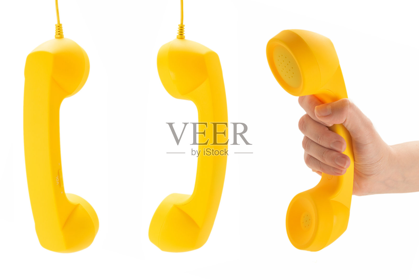 黄色手机在女人手上孤立在白色。照片摄影图片