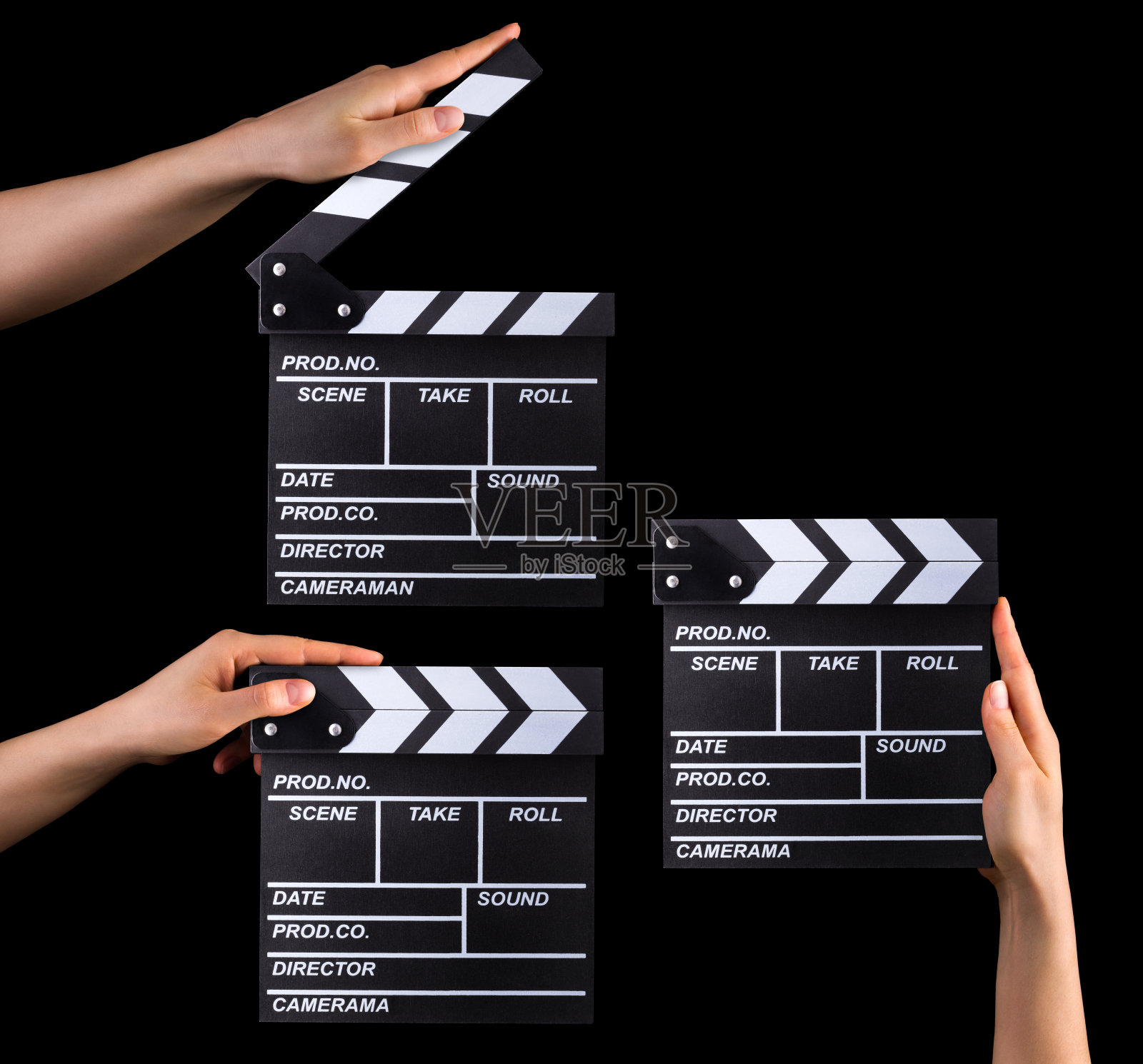 一套胶片拍板和人的手孤立在黑色背景上照片摄影图片