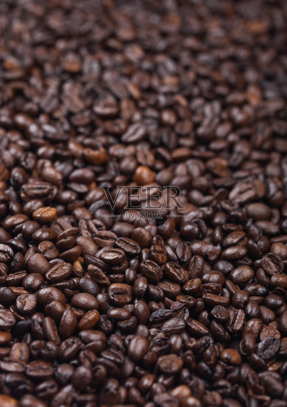 新鲜的生有机咖啡豆俯视图背景。照片摄影图片