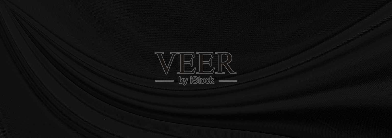 黑灰色的缎子，深色的织物，纹理豪华闪亮，抽象的丝绸布料，全景的背景与图案，柔和的波浪模糊美丽。照片摄影图片