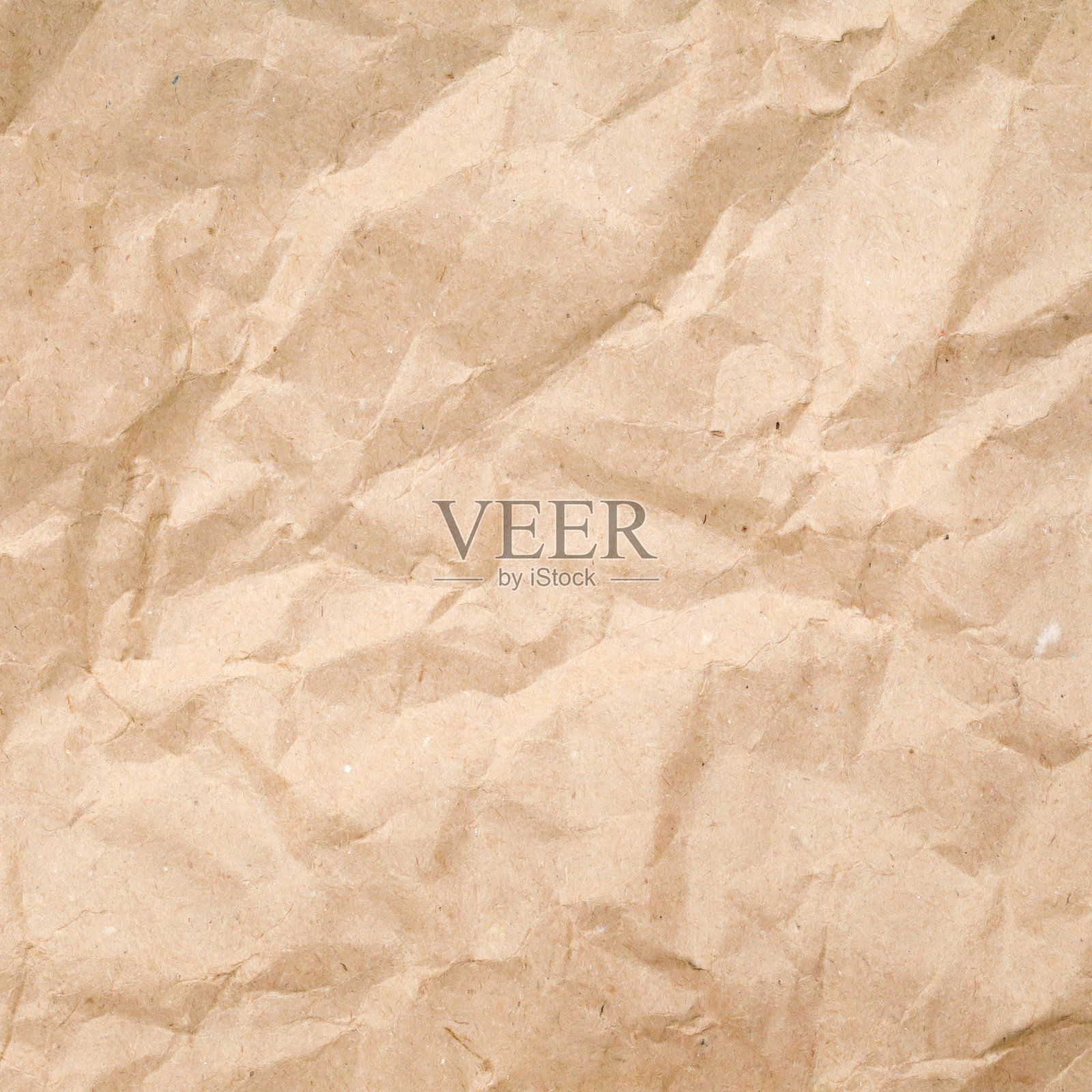 皱巴巴的牛皮纸，旧而粗糙的背景纸照片摄影图片