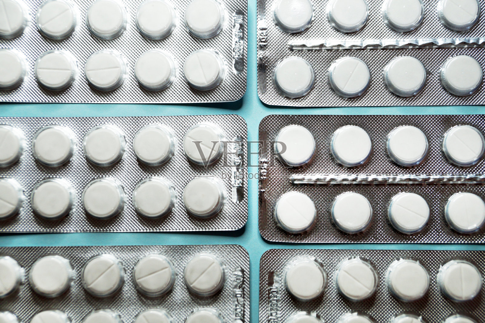 水泡中的白色药丸作为背景特写照片摄影图片