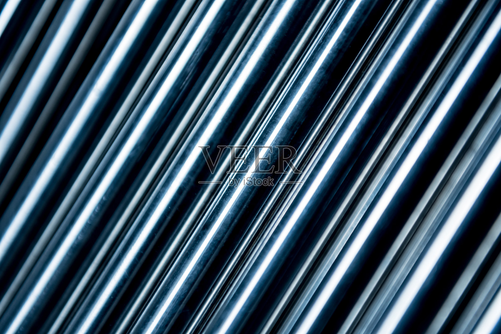 摘要背景钢管堆叠在托盘上照片摄影图片