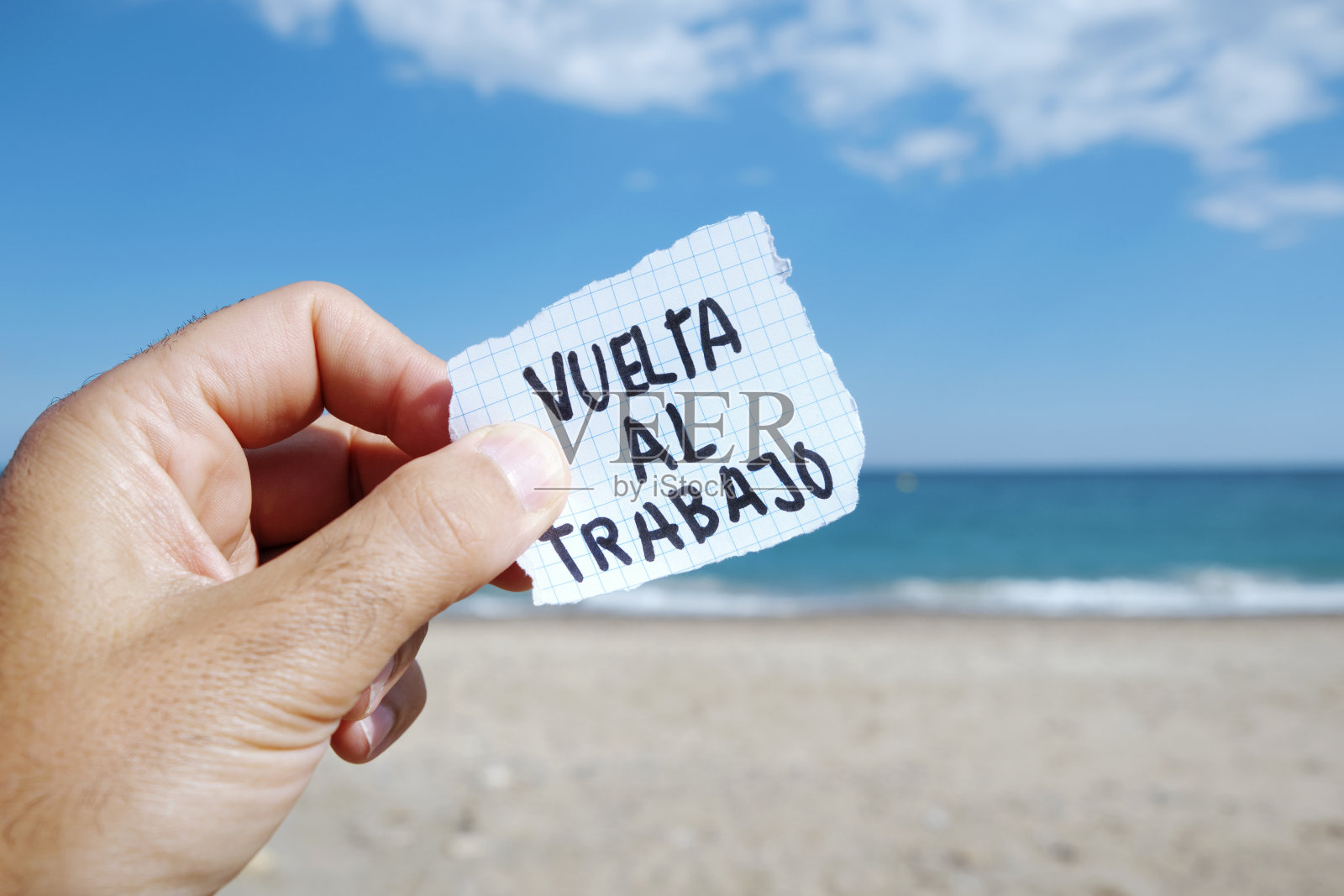 用西班牙语发短信回去工作照片摄影图片