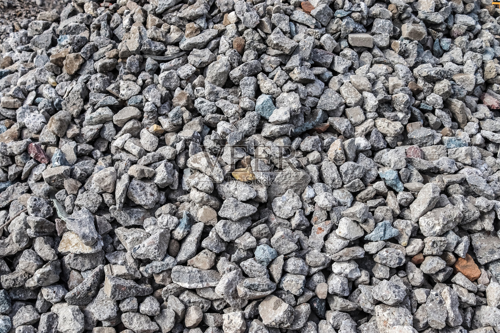 详细的近距离观看卵石和石子上的砾石地面纹理照片摄影图片