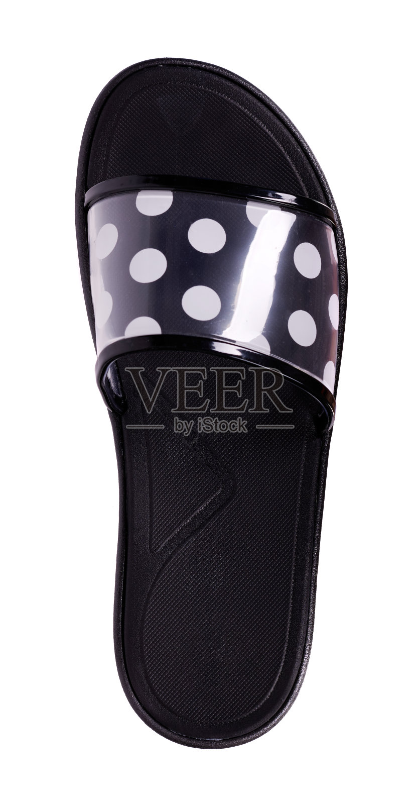 带点图案的黑色拖鞋，孤立在白色背景上。照片摄影图片
