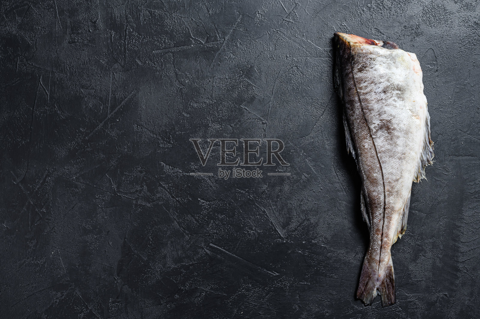 没有头的生黑线鳕黑色背景。前视图。本空间照片摄影图片